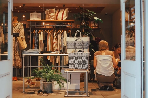 Two women shopping in small store